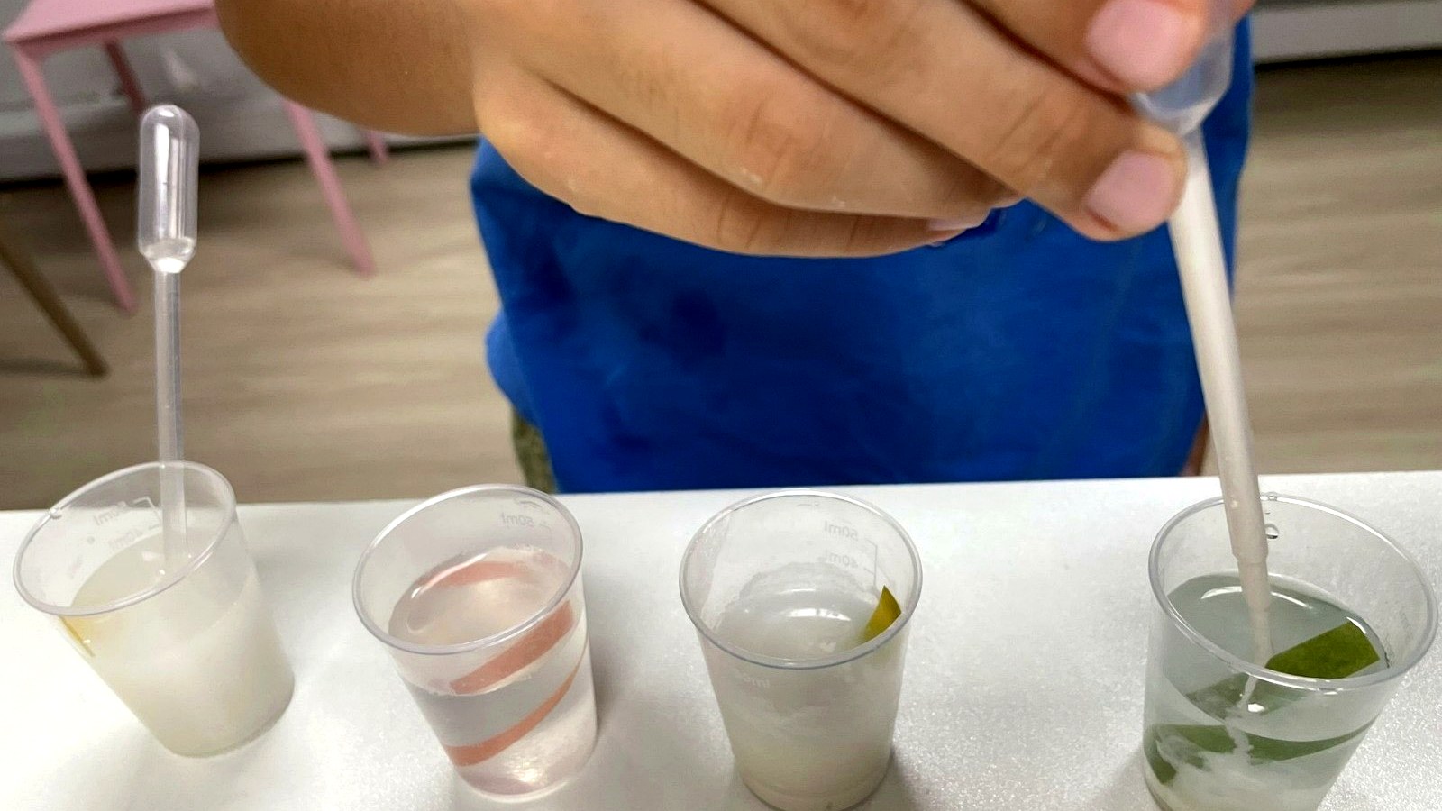 Child doing a liquid science experiment